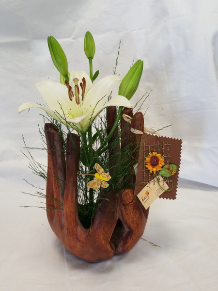 Flower arrangement - Served with both hands