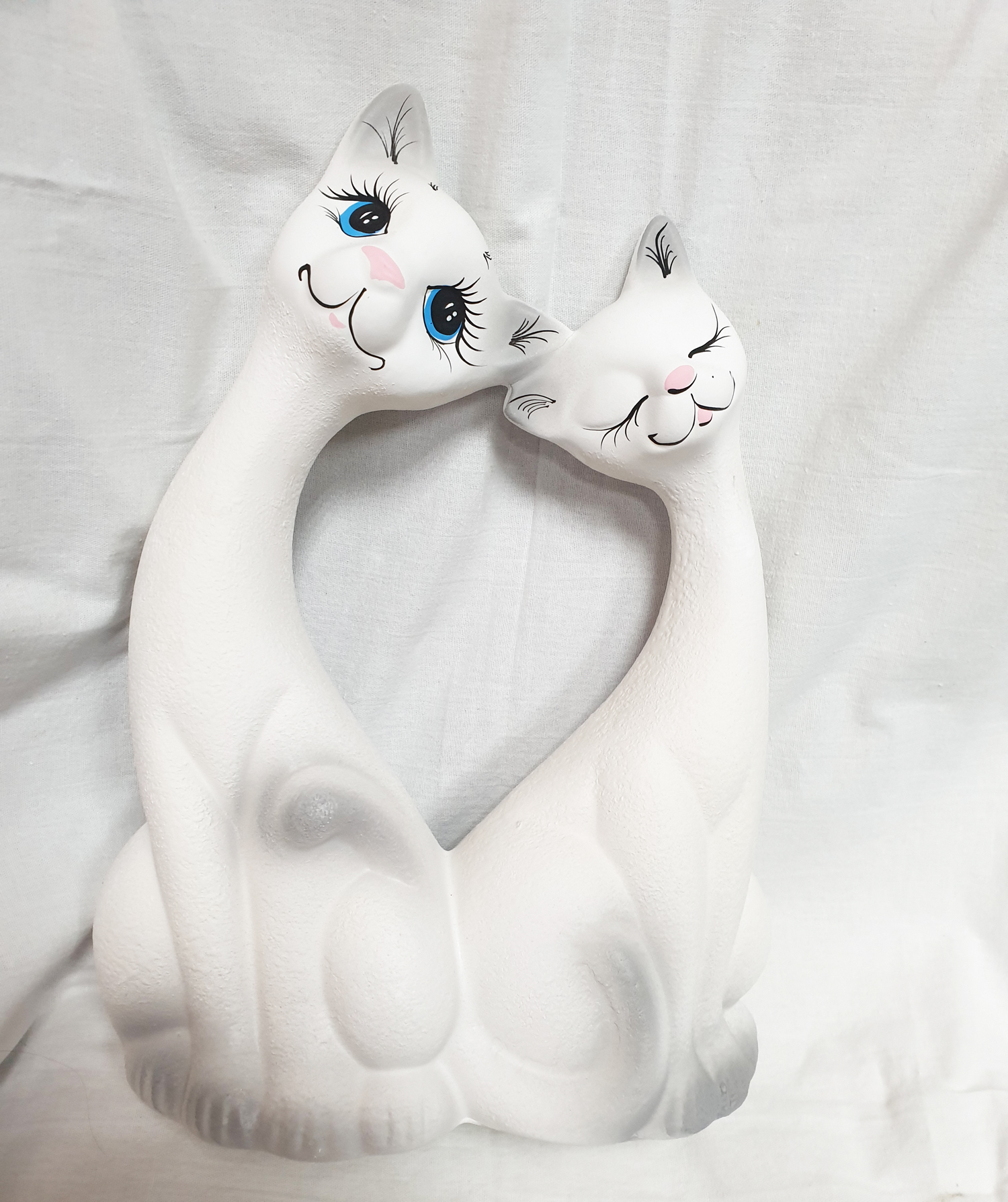Ceramic cats in love