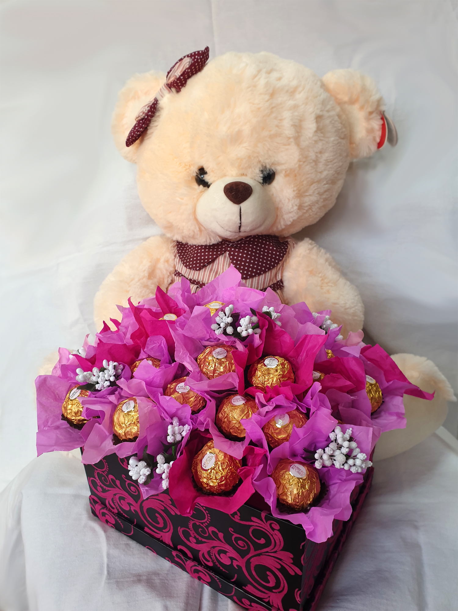 Bouquet of pink Ferrero Rocher temptation and teddy bear