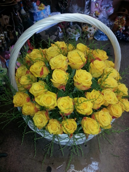 Basket with yellow roses